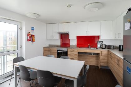 A shared kitchen in Wentworth College. Example room layout. Actual layout and furnishings may vary. 